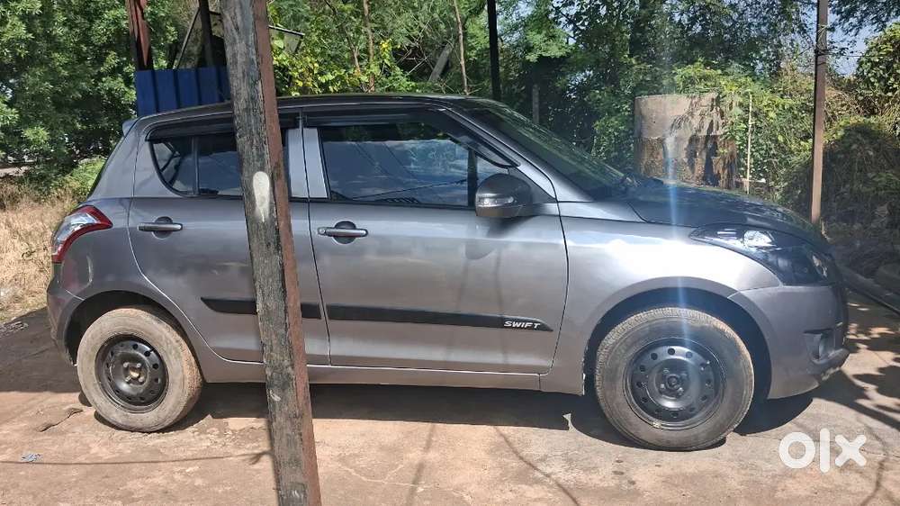 Maruti Suzuki Swift Lxi 2013