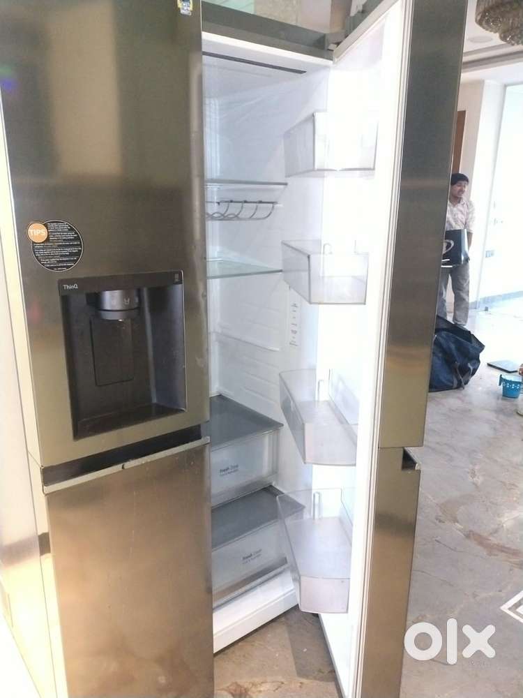 Double door with ice maker and water restorer
