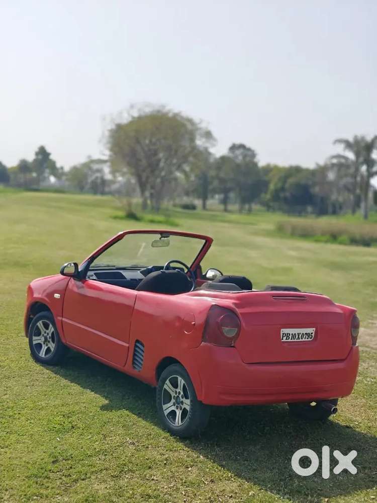 2 Window Red Modified Car  Good Condition All Over Work