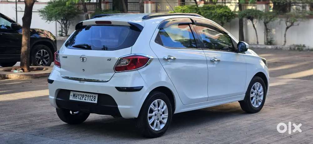 Make _ Tata 
Variant _  Tiago Xz Petrol 
Model _ 2018(2),
