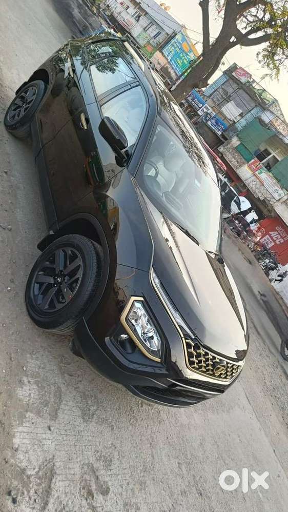 New Tata Safari Gold Xza+ Dark Edition