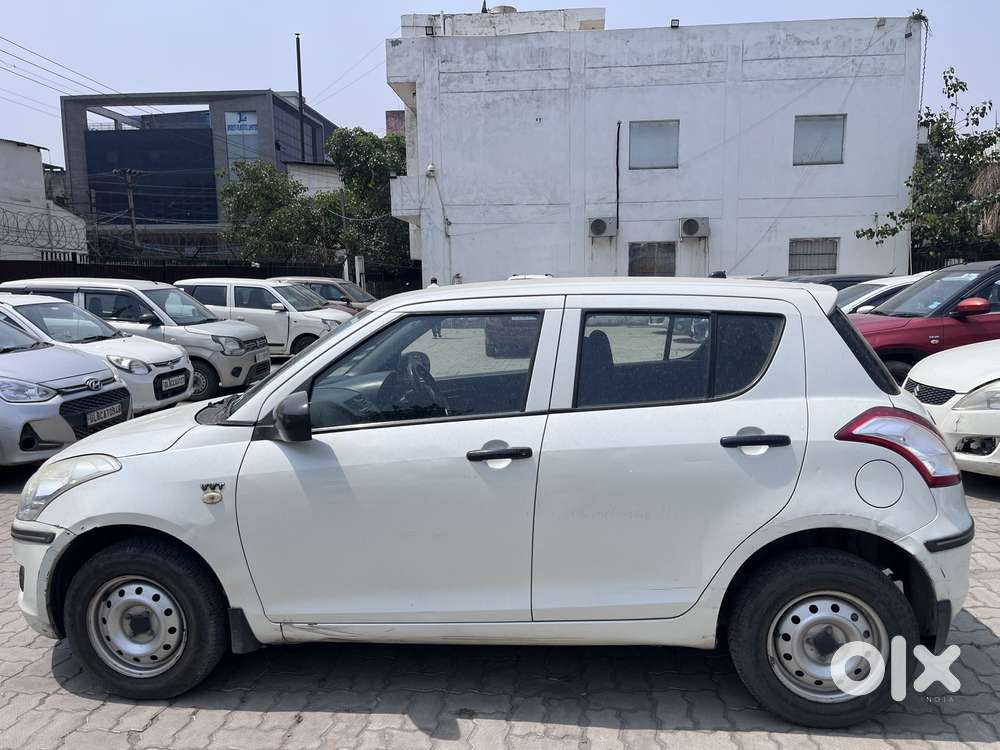Maruti Suzuki Swift 1.2 Lxi (o), 2014, Petrol