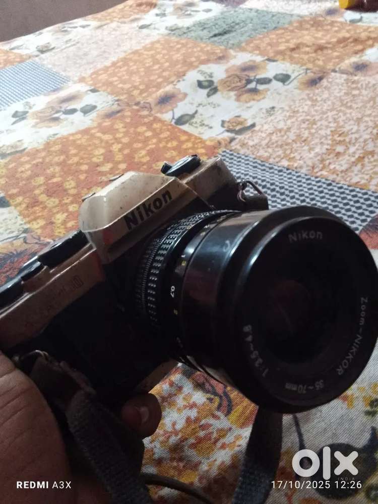 Nikon camera old model real camera but show piece Cameras