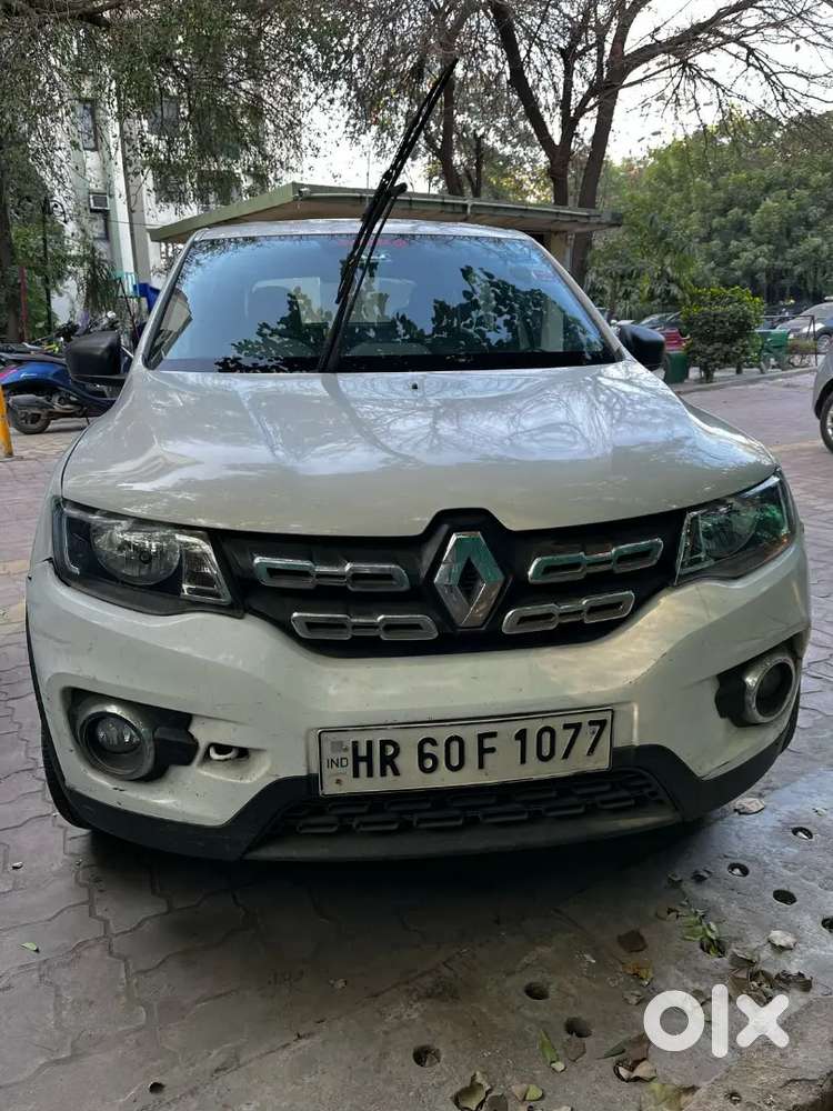 A Renault Kwid Rxt 0.8 In White Colour Only 30,000 Km Driven Hr Number