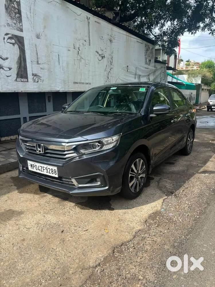 Grey Colour Honda Amaze Good Maintain New Condition