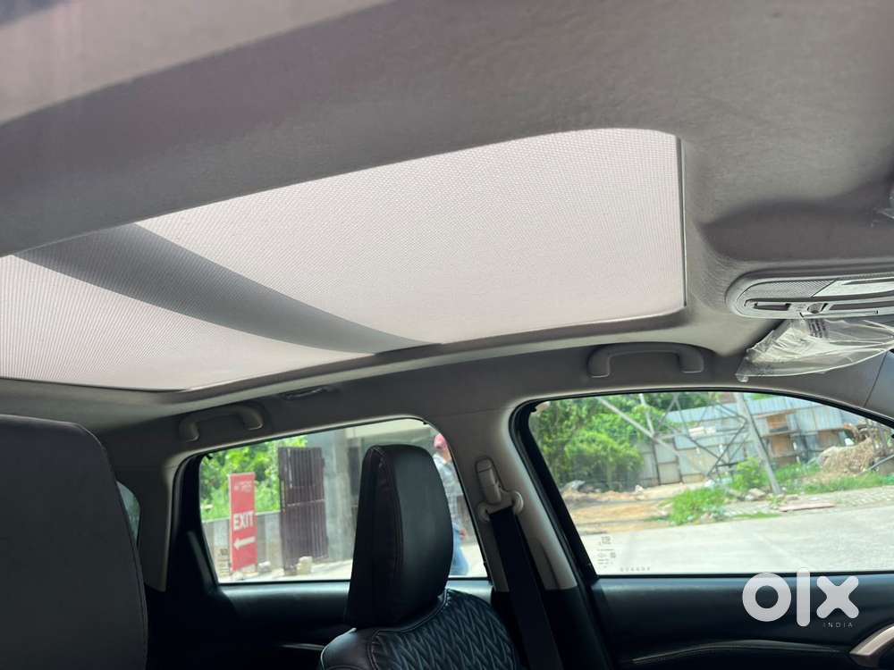 Maruti Suzuki Grand Vitara 1.5 Zeta Plus Dual Tone Intelligent Hybri..