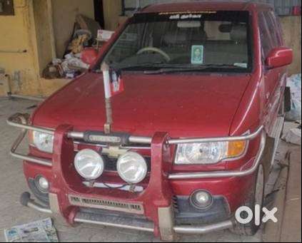 Well Maintained 2012 Red Tavera 10 Seater For Sale