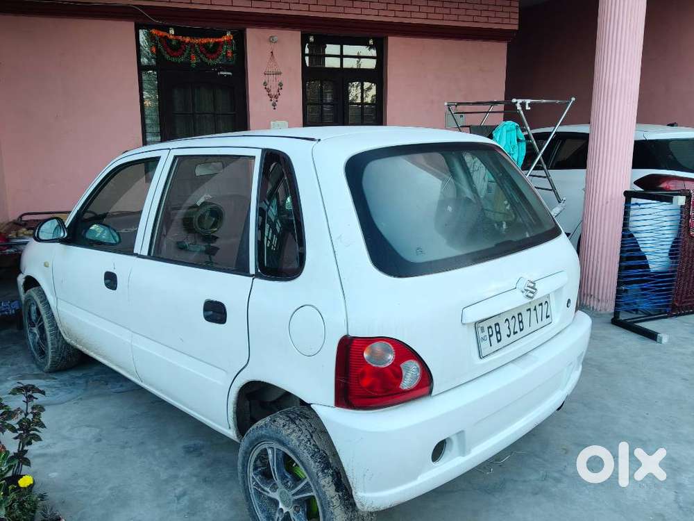 White Colour Zen In Good Condition With Modified Allow Wheel And Tyres