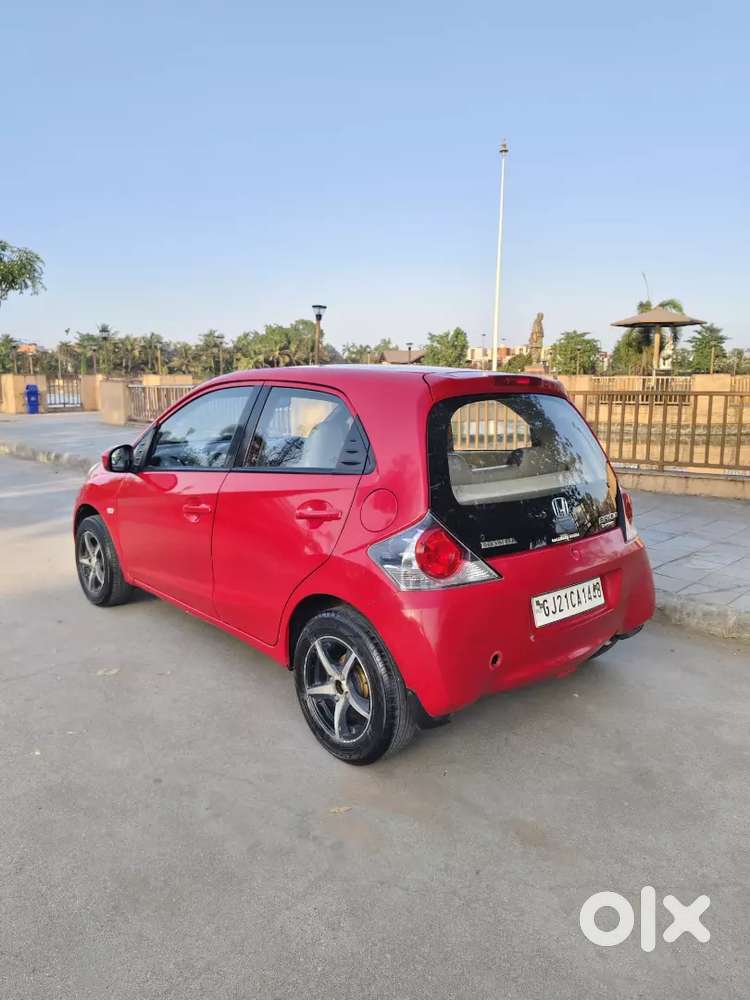 Honda Brio Sporty Look 
 Magwiil Spot Tire Center Lock
