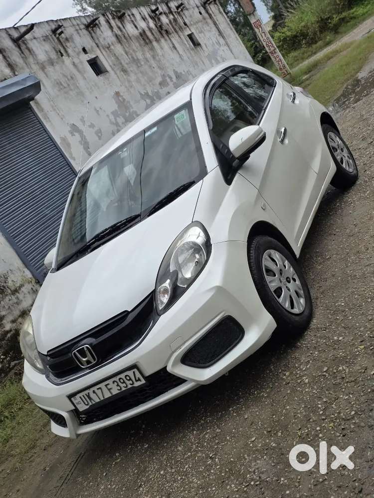 Honda Brio Smt
1st Owner 
Central Locking