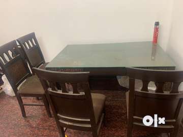 Olx dining best sale table 4 seater