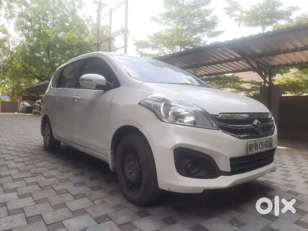 White Ertiga, Brand New Spare Tire, Only 1 Year Old Battery.