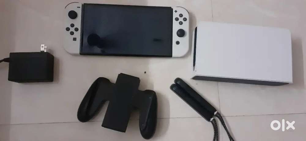 Nintendo switch OLED Model(64GB)- Mint condition + fifa 23 +dobe case