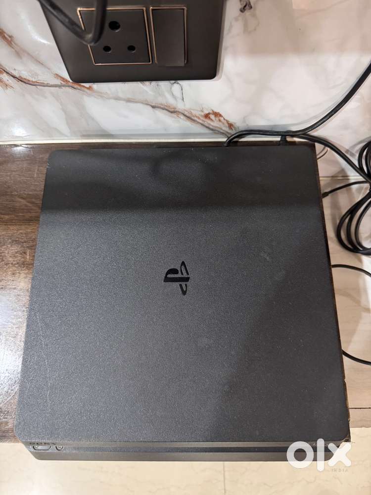 Ps4 slim 1TB With 1 controller (games & extra controller available)