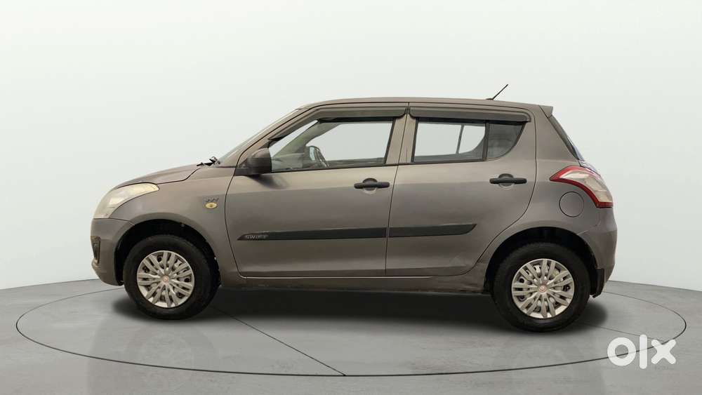 Maruti Suzuki Swift 1.2 Lxi (o), 2016, Petrol