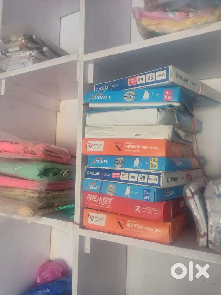सिलाई के लिए कटिंग काउंटर मोमोज फिंगर काउंटर सिलाई मशीन दो फर्नीचर रेक