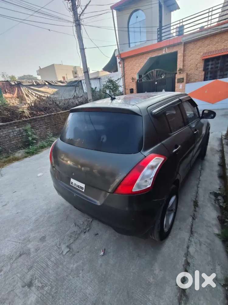 Maruti Suzuki Swift Lxi 2016