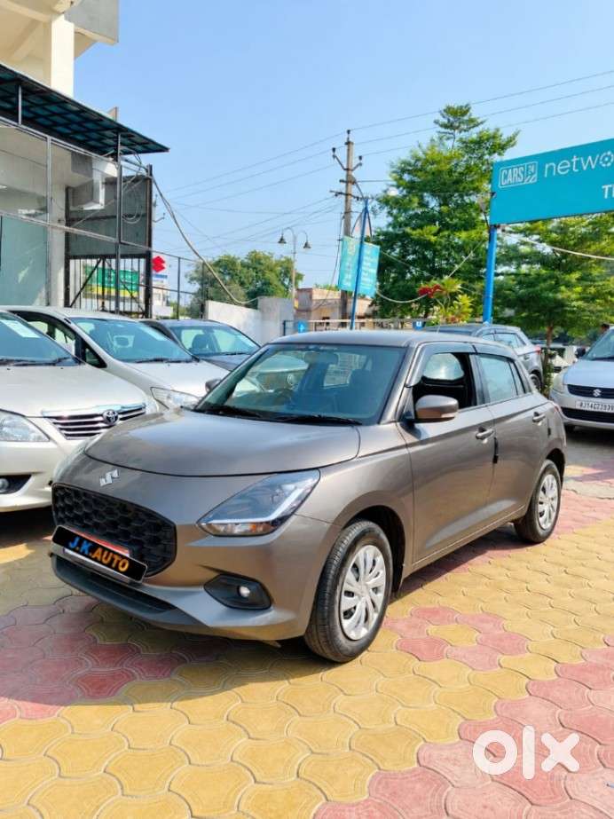 Maruti Suzuki Swift 1.2 Vxi (o), 2024, Petrol