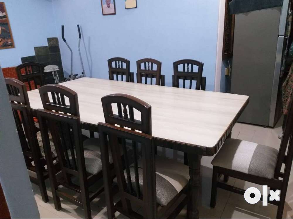 8 seater deals dining table olx