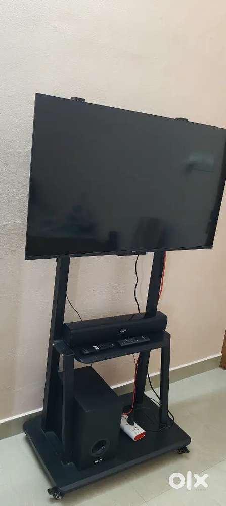 Tv with stand and Speaker