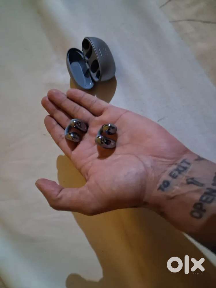 boAt Newly Launched Airdopes Loop OWS Earbuds w/Clip-On Fit, Air Condu