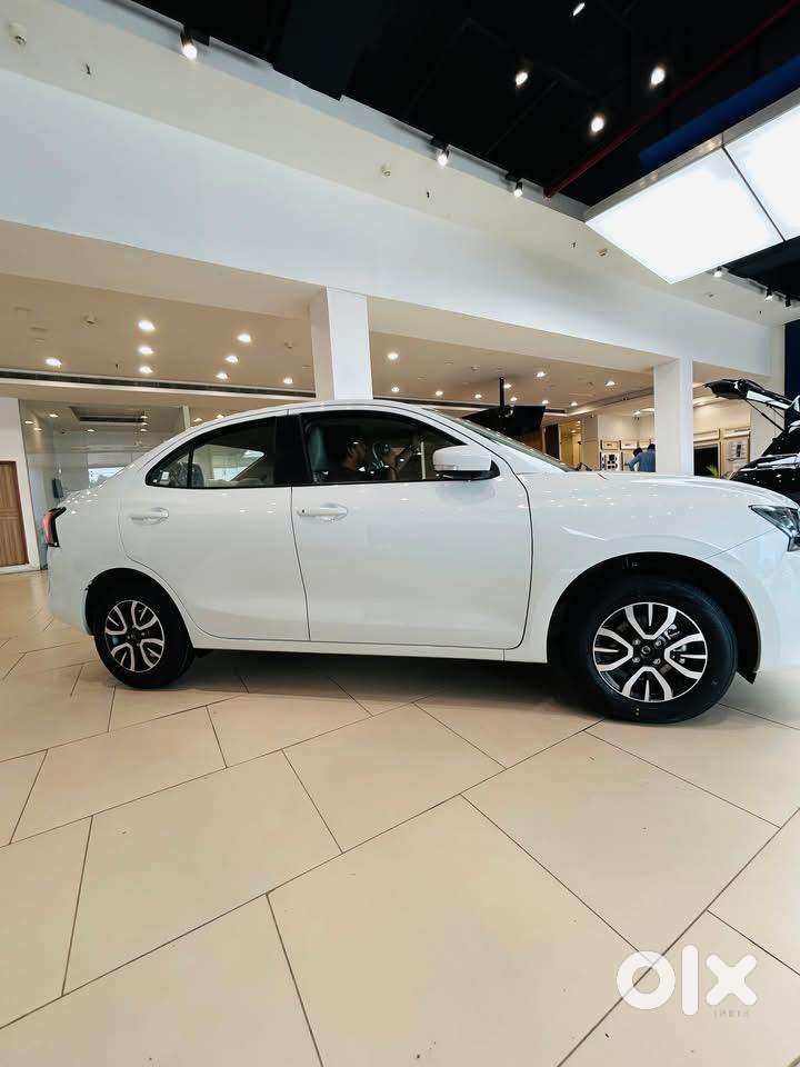 2026 Swift Dzire Tour S Cng 50,000/-