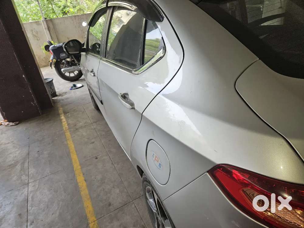 Tata Tigor 1lakh Km Driven Showroom Maintained