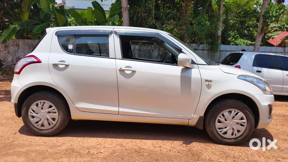 Maruti Suzuki Swift 1.2 Lxi (o), 2017, Petrol
