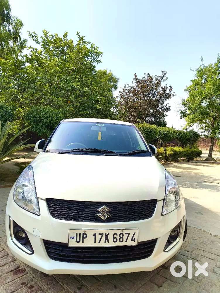 “maruti Suzuki Swift Vxi 2015 White  40k Driven  Insurance Valid”