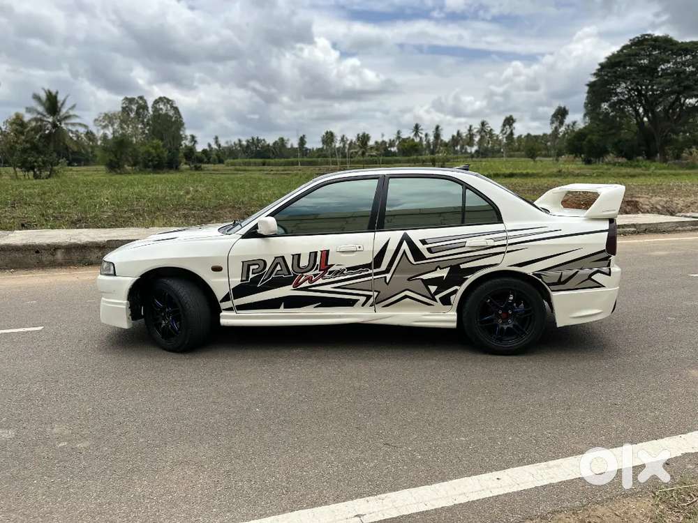 #lancer  
Petrol Manual 2002 Model

 Ownership : 4th Owner
 Km D