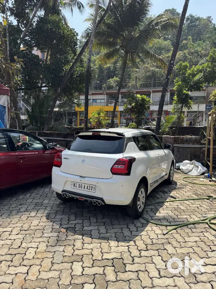 Swift Vxi
 White
 43km
Excellent Condition
Power Window
Power Steerin
