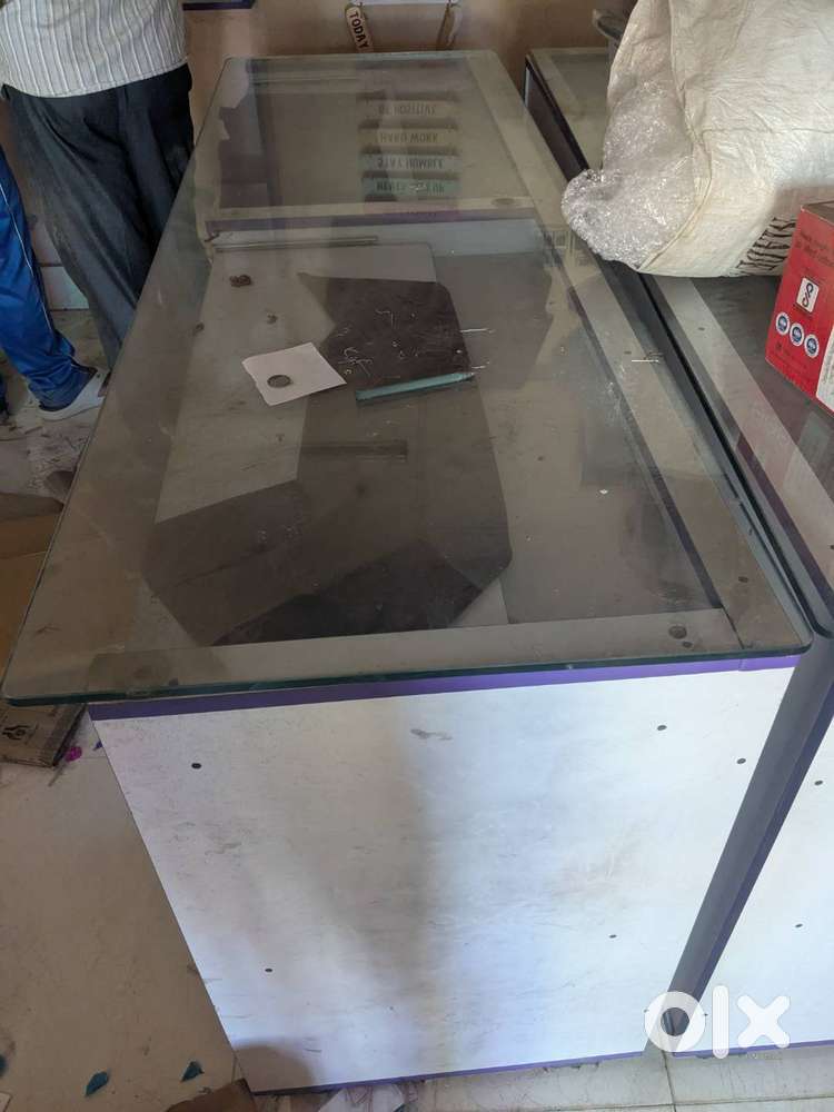 Shop using cupboard Racks & billing Tables