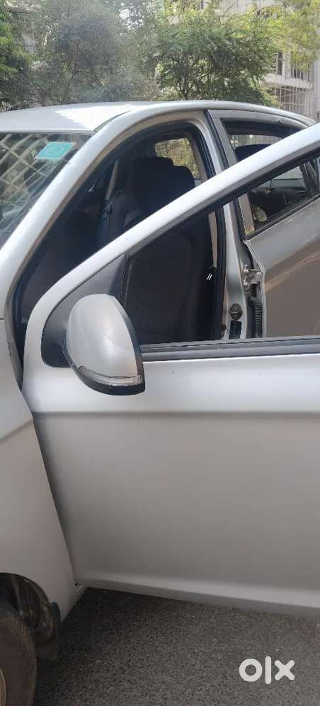 I20, 2nd Owner, Gujrat Registration, Petrol, Sportz ,silver Color,.