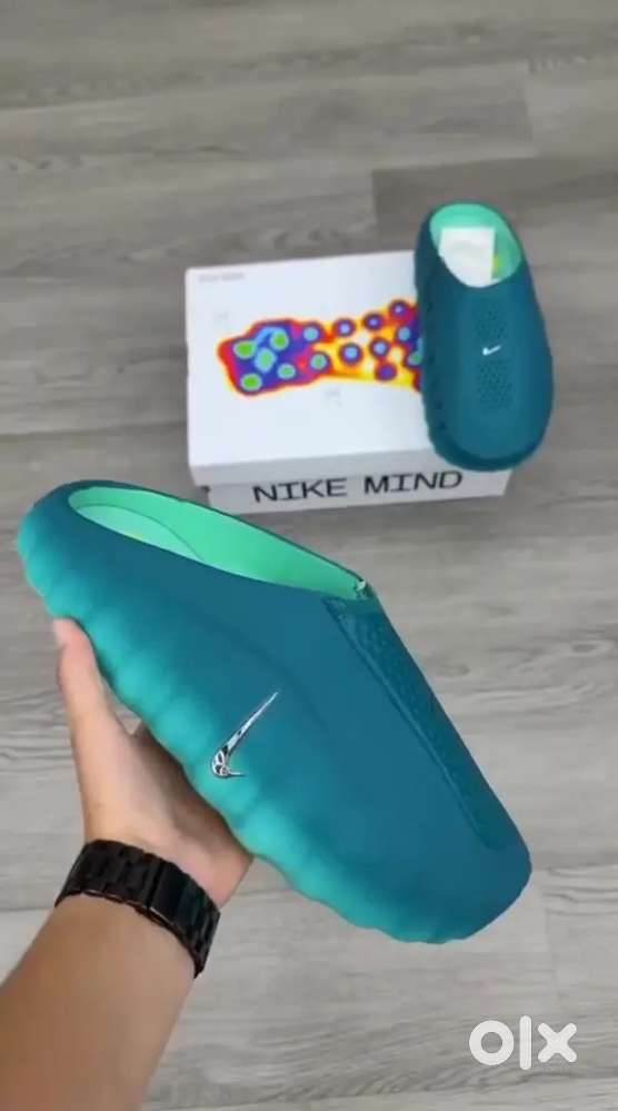 Nike Mind 001 Mules in the Geode Teal Light Menta colorway - Men