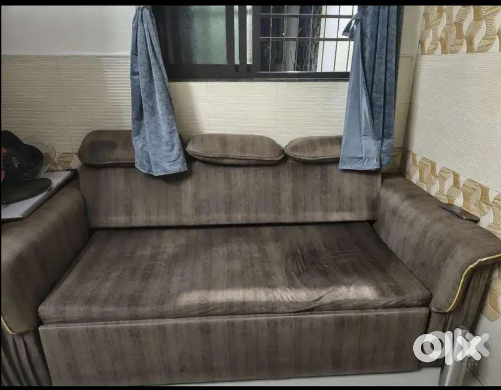 I have wooden sofa cum bed of 3 person with storage