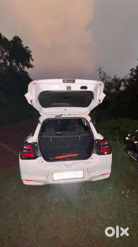 Maruti Swift Vxi Optional 2024