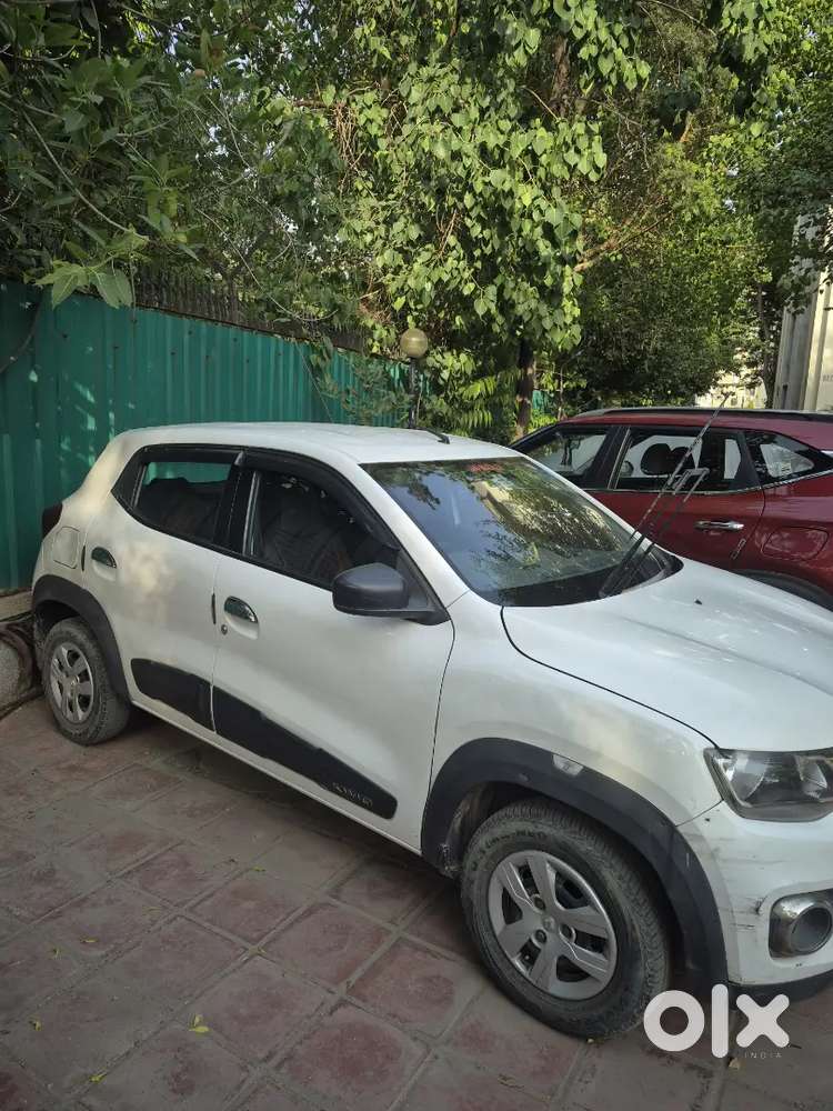 A Renault Kwid Rxt 0.8 In White Colour Only 30,000 Km Driven Hr Number