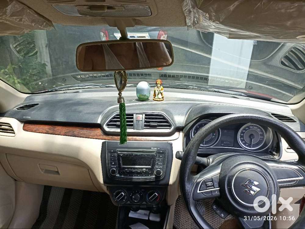 Maruti Suzuki Dzire ( Gallant Red). First Owner