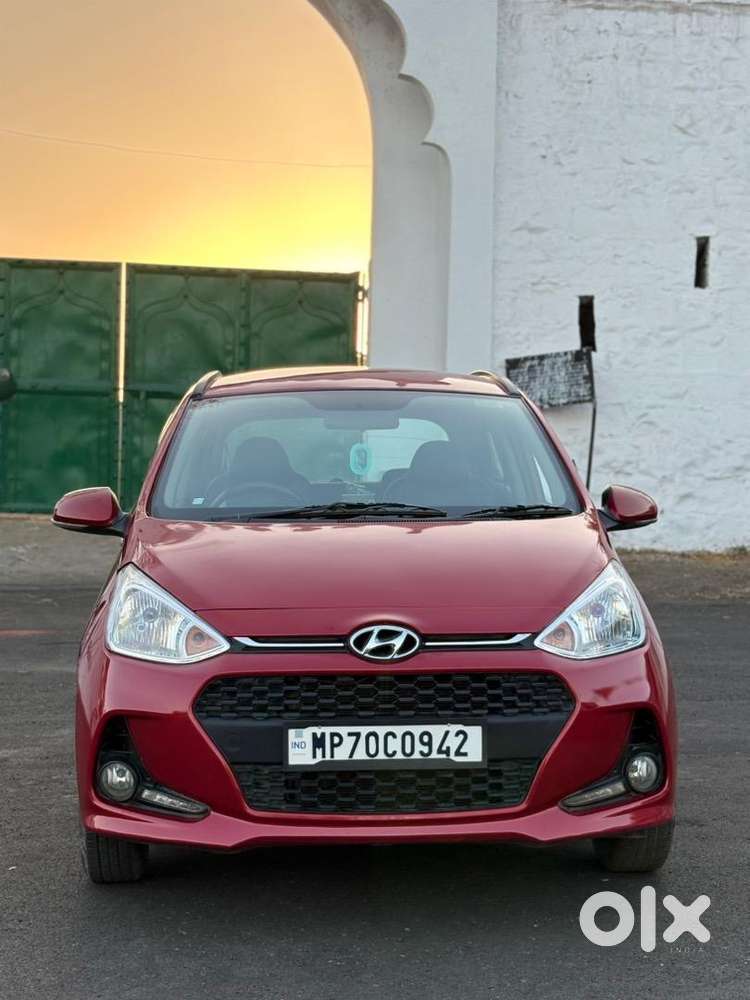 2018 Hyundai Grand I10 Red   First Owner  56,399 Km  ₹3,60,000
