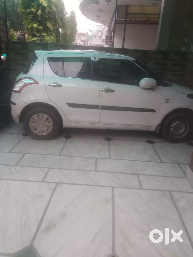 Maruti Suzuki Swift Lxi 2016