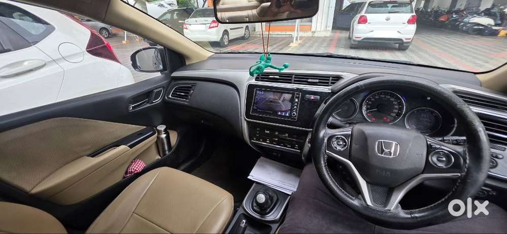 Honda New City V (petrol + Cng) Golden Brown