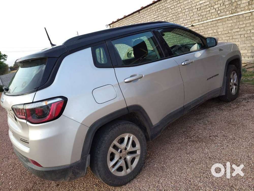 Bank Manager's Single Handed Silver Jeep Compass