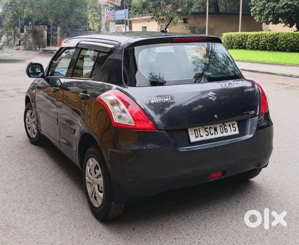 Maruti Suzuki Swift Lxi Optional-o, 2015, Petrol