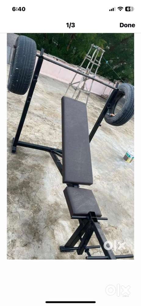 Gym bench with rod and weight