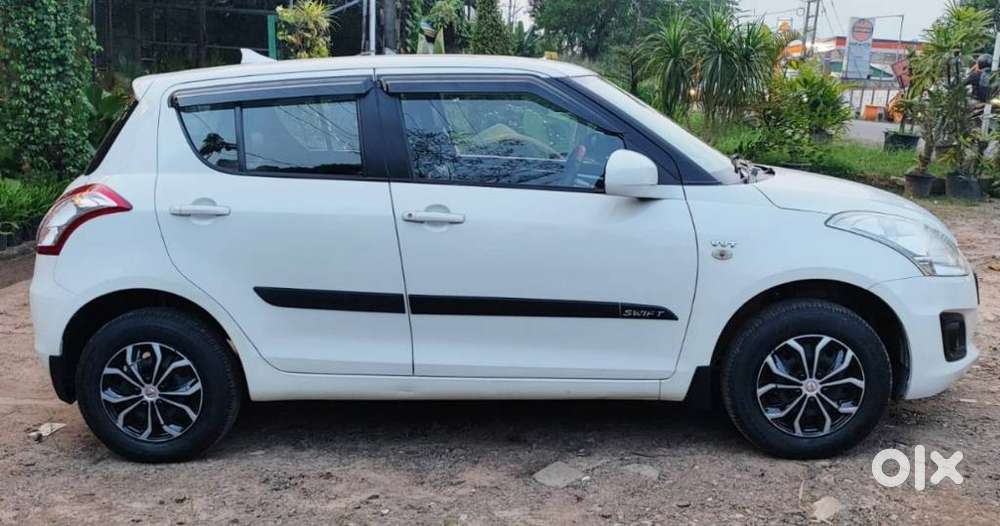 Maruti Suzuki Swift Lxi Optional-o, 2017, Petrol