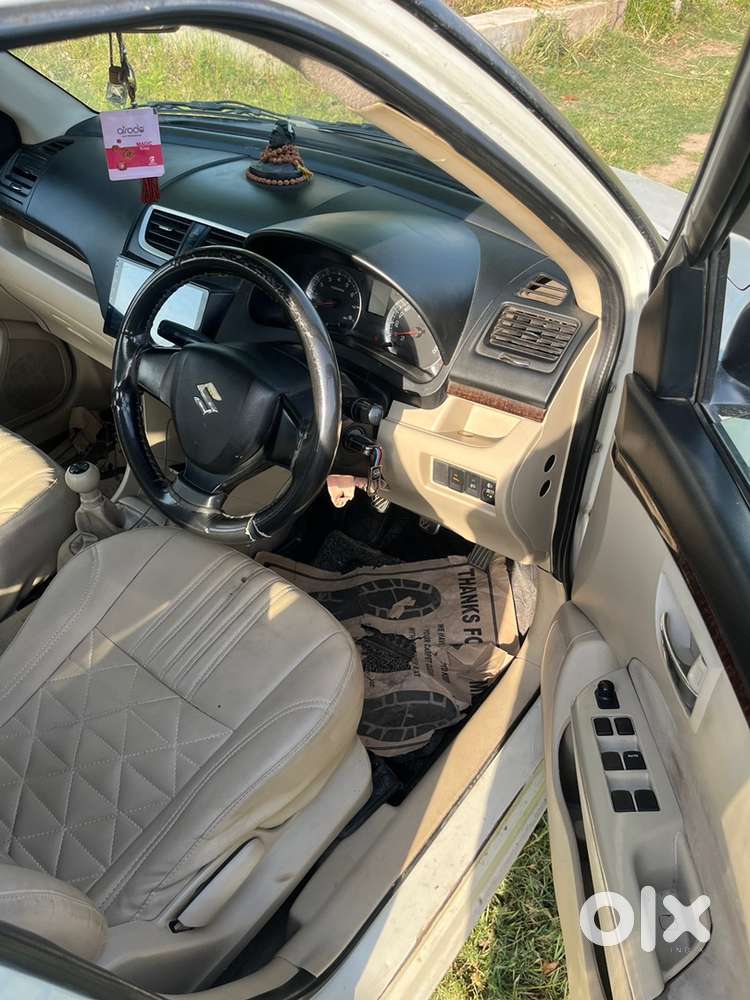 Maruti Suzuki Dzire 2013-14 25kmpl Mileage