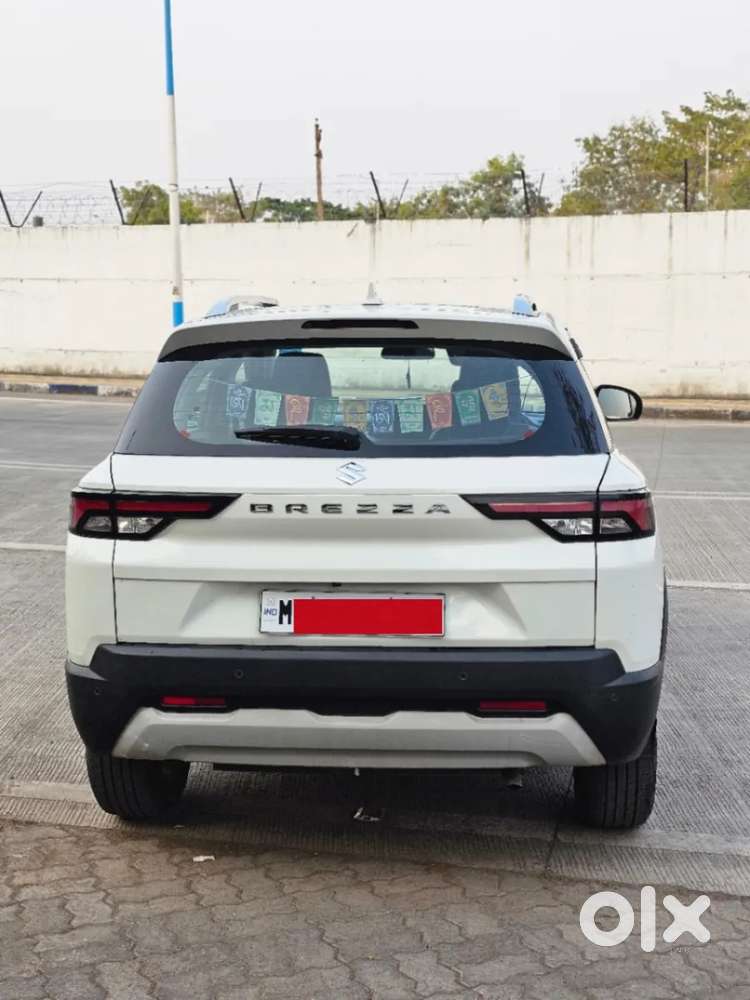 Maruti Suzuki Brezza 1.5 Zxi Plus Smart Hybrid Dual Tone, 2023, Petr..