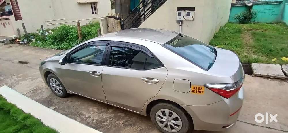 Toyota Corolla Altis Yellow Board