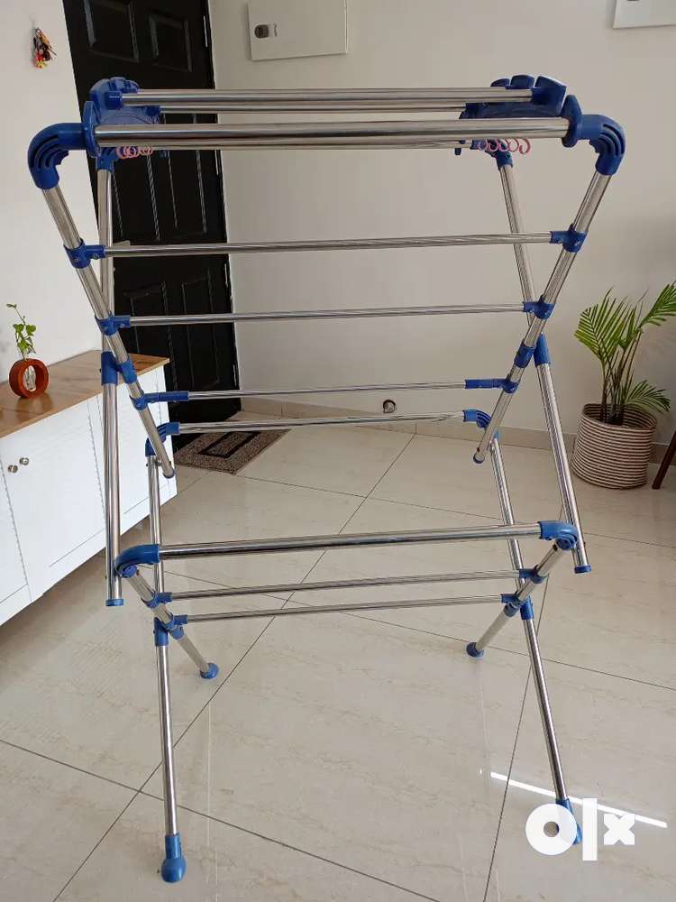 Olx cloth drying online stand