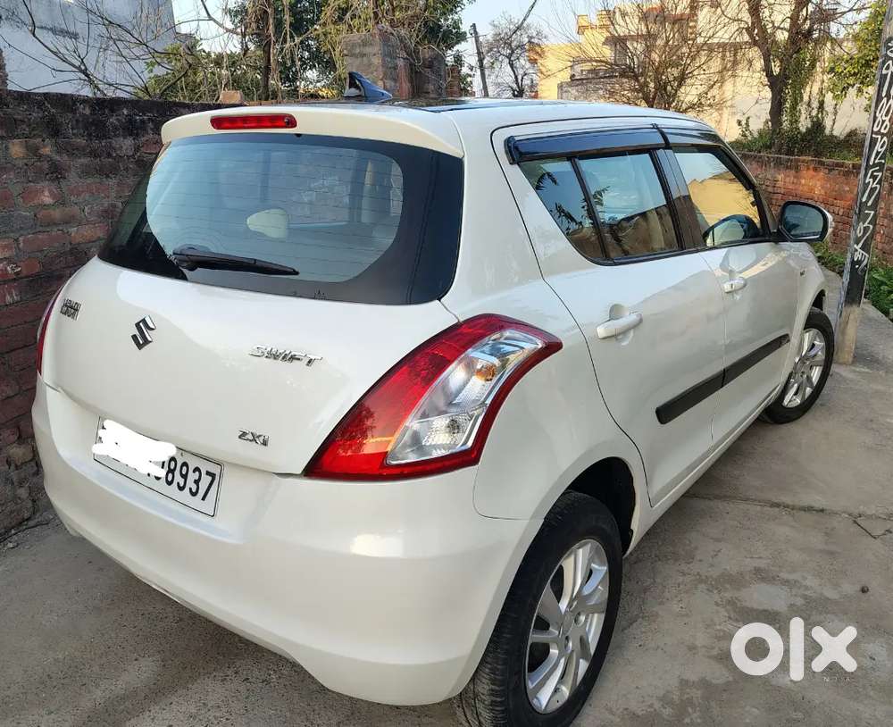 Swift Petrol Zxi Top Model